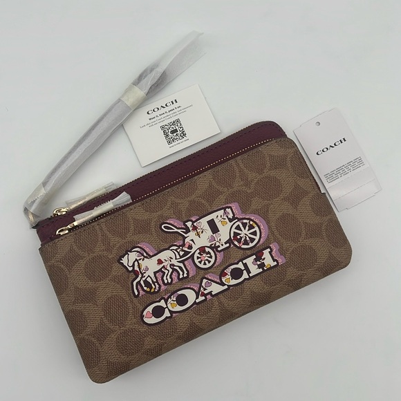 Coach Double Zip Wallet In Signature Canvas With Horse And Carriage Print